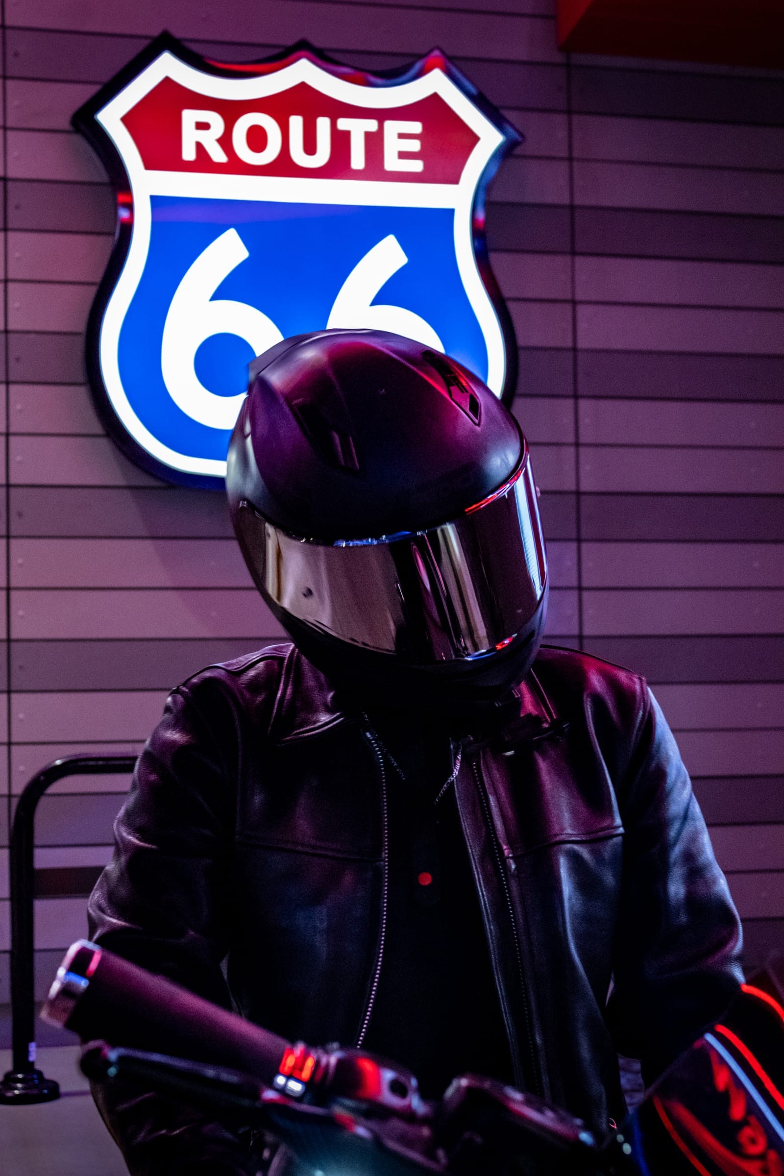Brandon on his bike in front of the Route 66 sign